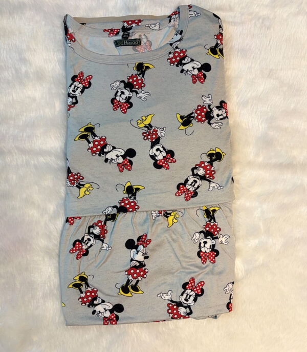 The Minnie Mouse lounge dress offers unmatched comfort and cuteness, with a soft cotton blend and fun all-over Disney print – ideal for home or sleepwear.