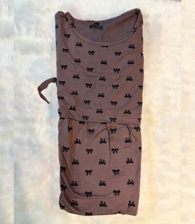 Add a cute twist to your lounge routine with this choco-colored dress featuring sweet little bows and ultimate softness.