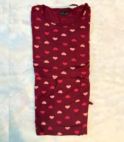 Fall in love with comfort! This heart-printed lounge dress is sweet, soft, and perfect for your cozy moments at home.